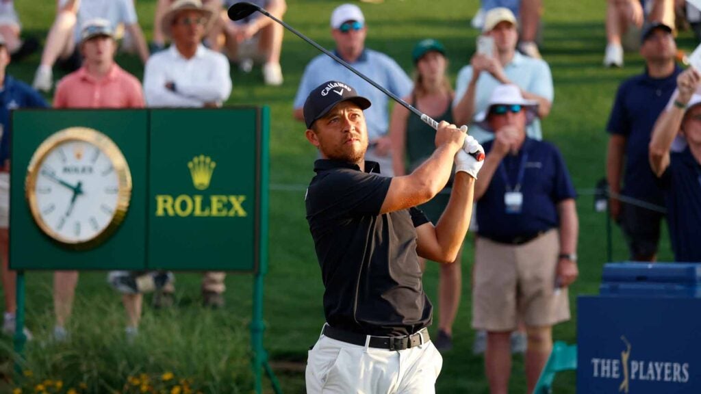 xander schauffele swings during the third round of the 2024 players championship