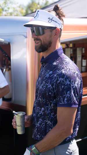 Michael Phelps checking out the Dewar's bar cart