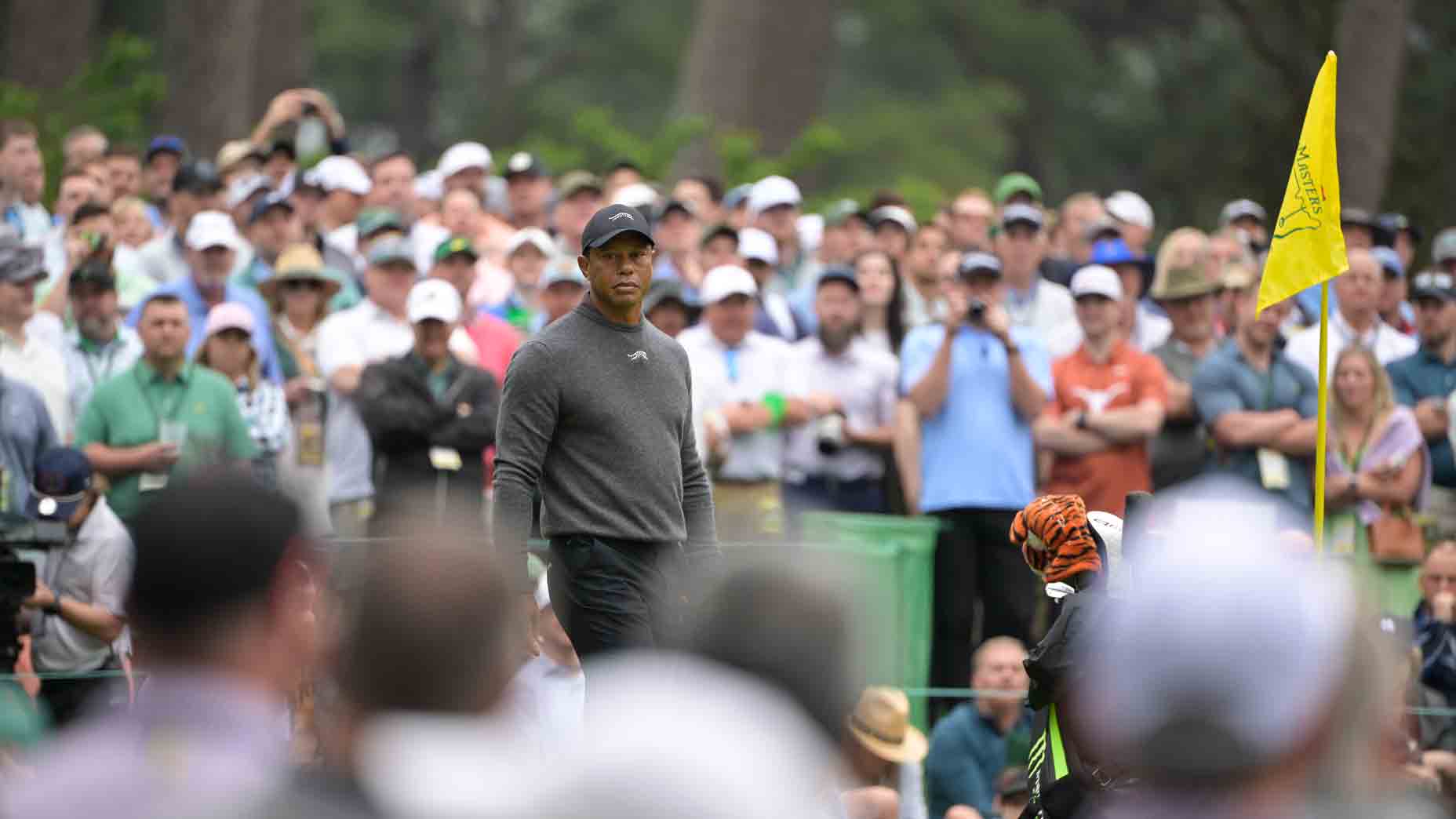 Tiger Woods stands on tee Tuesday at 2024 Masters