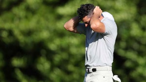 Rory McIlroy of Northern Ireland reacts after a double bogey on the 11th hole during the second round of the 2024 Masters Tournament at Augusta National Golf Club on April 12, 2024 in Augusta, Georgia.