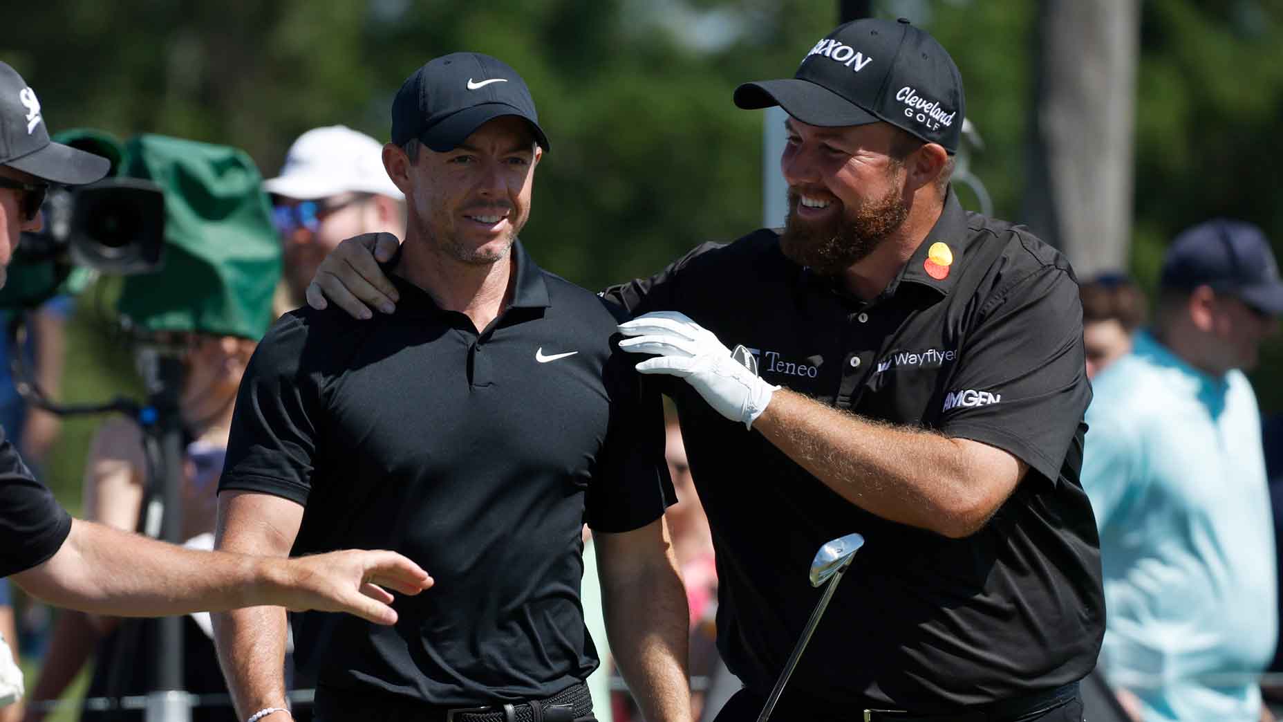 Shane Lowry of Ireland and Rory McIlroy of Northern Ireland speak at the 17th tee during the second round of the Zurich Classic of New Orleans at TPC Louisiana on April 26, 2024 in Avondale, Louisiana.