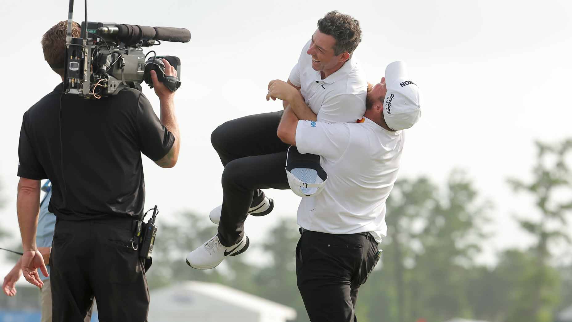 Rory McIlroy and Shane Lowry celebrate at the Zurich Classic.