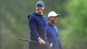 Rory McIlroy and Tiger Woods smile at the 2023 Masters.