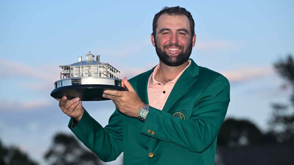 Scottie Scheffler poses with the winner's trophy as the 2024 Masters Champion after the final round of Masters Tournament at Augusta National Golf Club on April 14, 2024 in Augusta, Georgia.