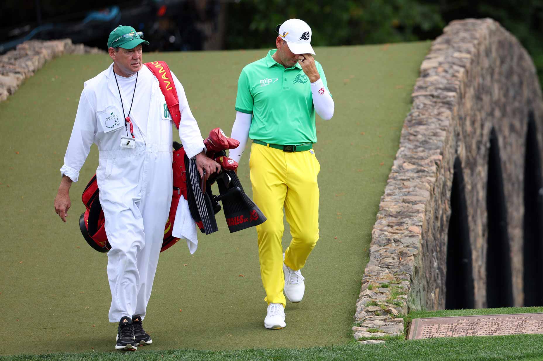 Sergio Garcia crosses a bridge at Augusta National.