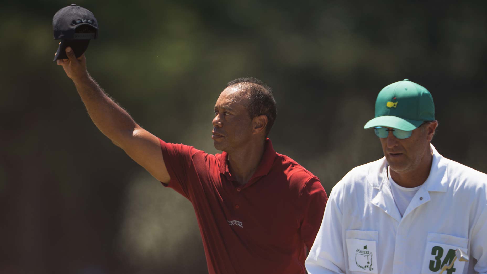 Tiger Woods acknowledges the patrons at the Masters.