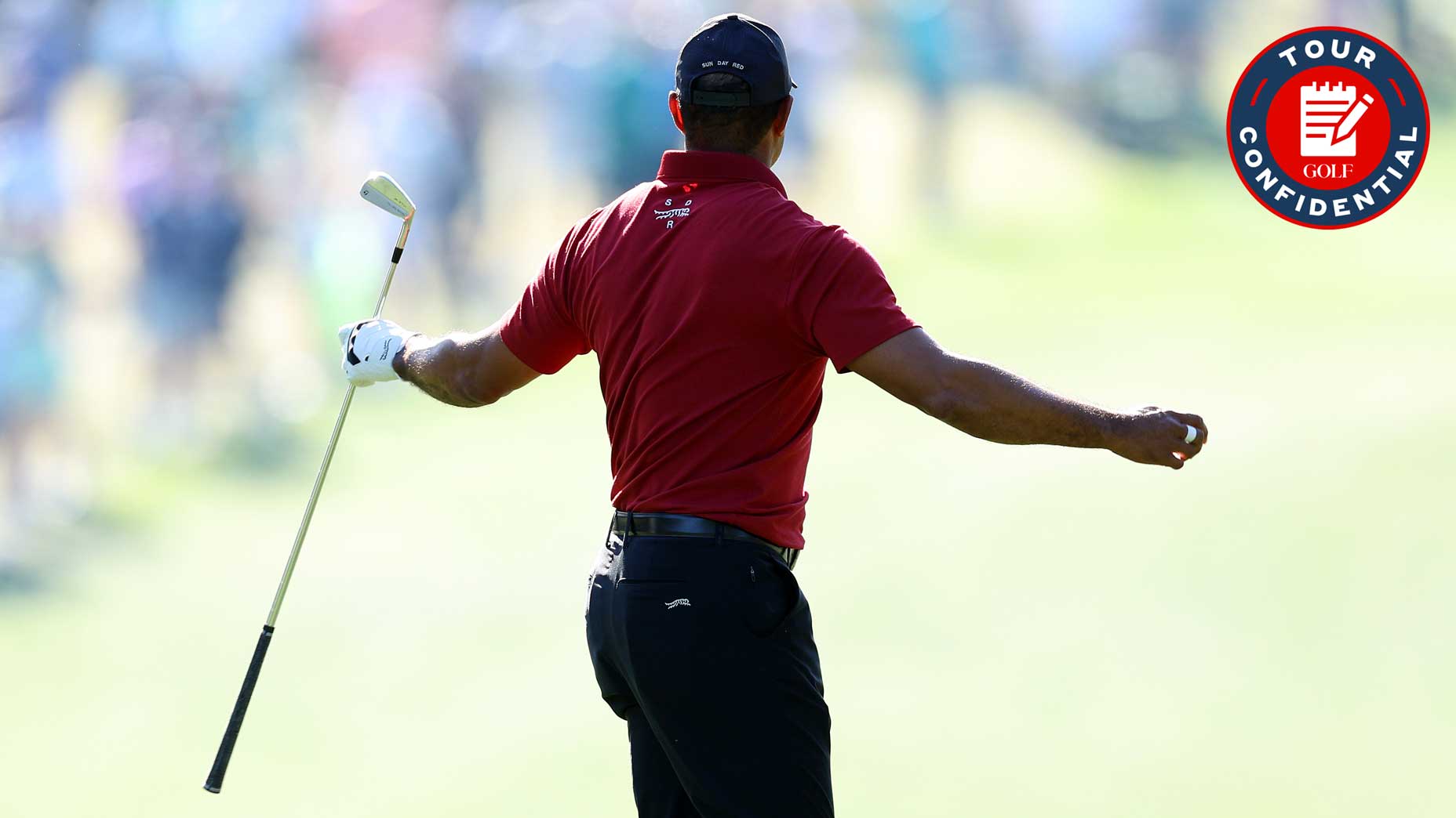 Tiger Woods reacts to his shot at the Masters