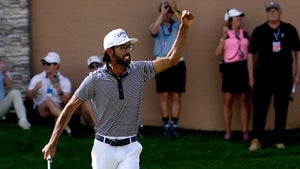 Akshay Bhatia celebrates after making a putt.