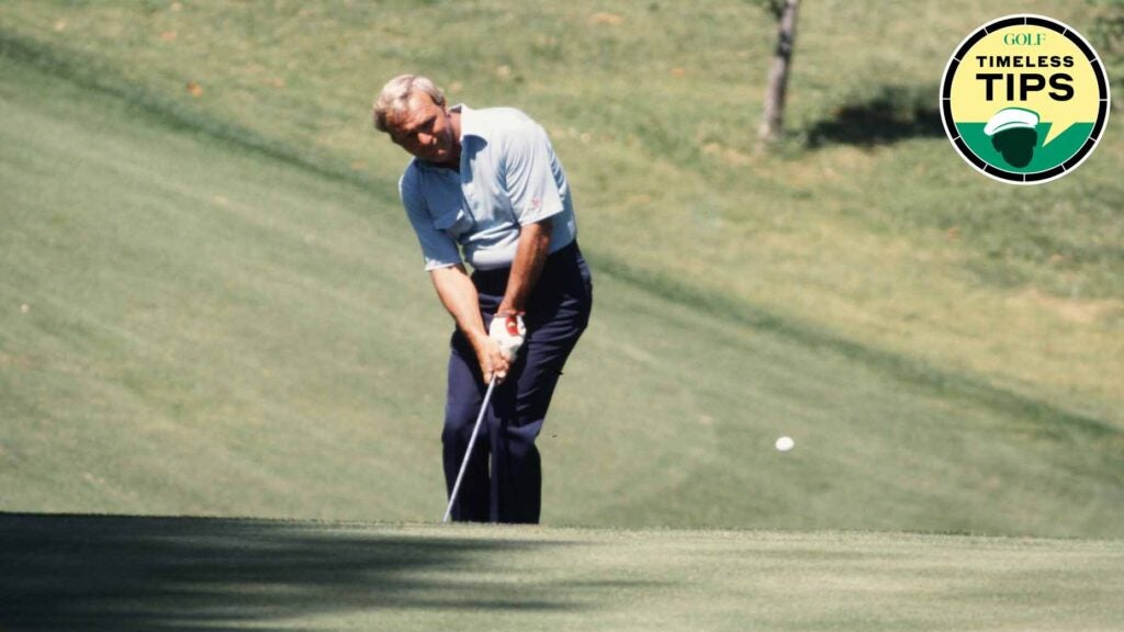 arnold palmer hits a wedge shot during the 1977 masters