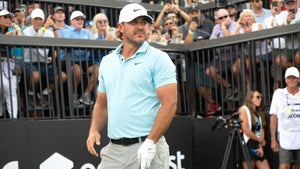 Pro golfer Brooks koepka stands on tee at liv golf miami in 2023.