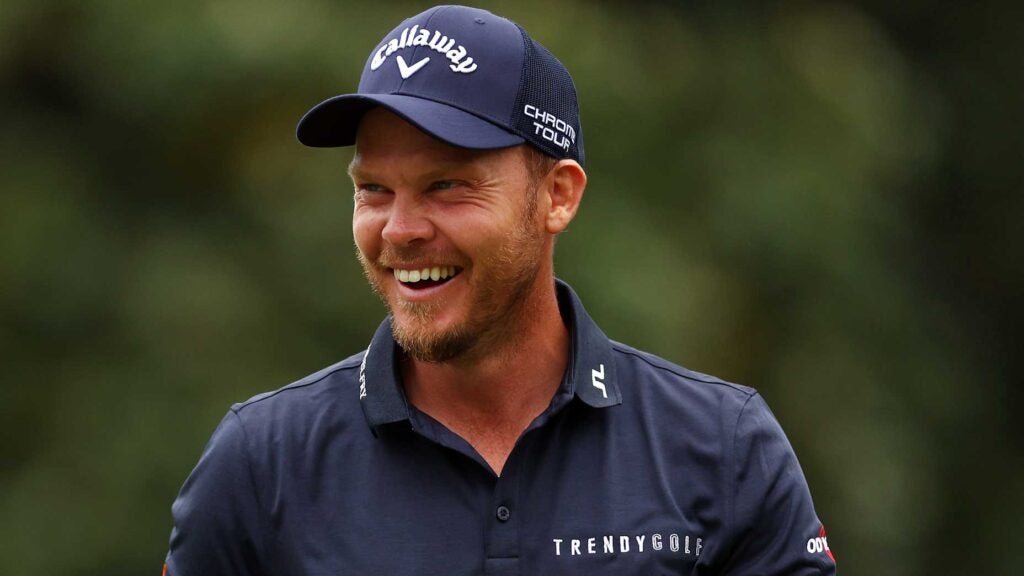Danny Willett smiles at the Masters.