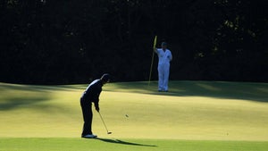 michael campbell hits a putt on the fifth green at augusta national during the 2010 masters
