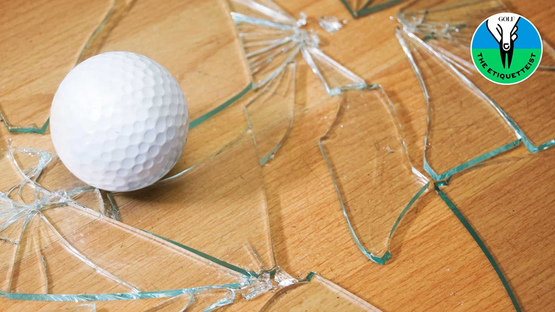 a golf ball hits a window