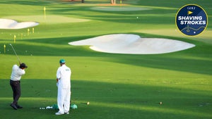 Pro golfer hits shot during 2024 Masters at Augusta National