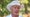 greg norman speaks at masters tournament in white logoed safari hat