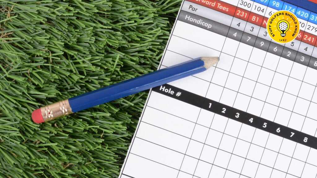 A golf scorecard and a pencil