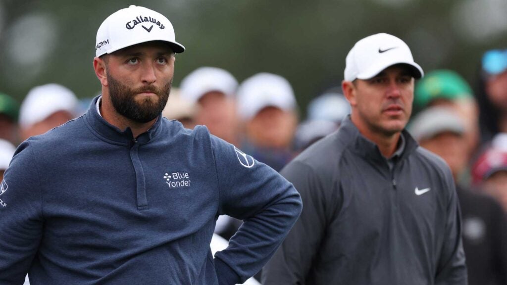 Jon Rahm and Brooks Koepka wait on tee during 2023 Masters at Augusta National