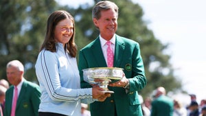 lottie woad accepts ANWA trophy from ANGC chairman fred ridley