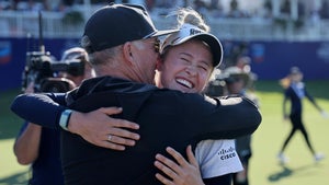 nelly korda hugs father petr at Chevron Championship.