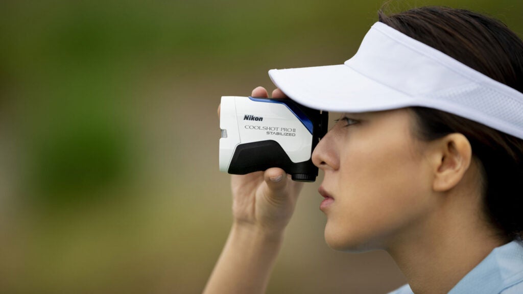 golfer with nikon rangefinder