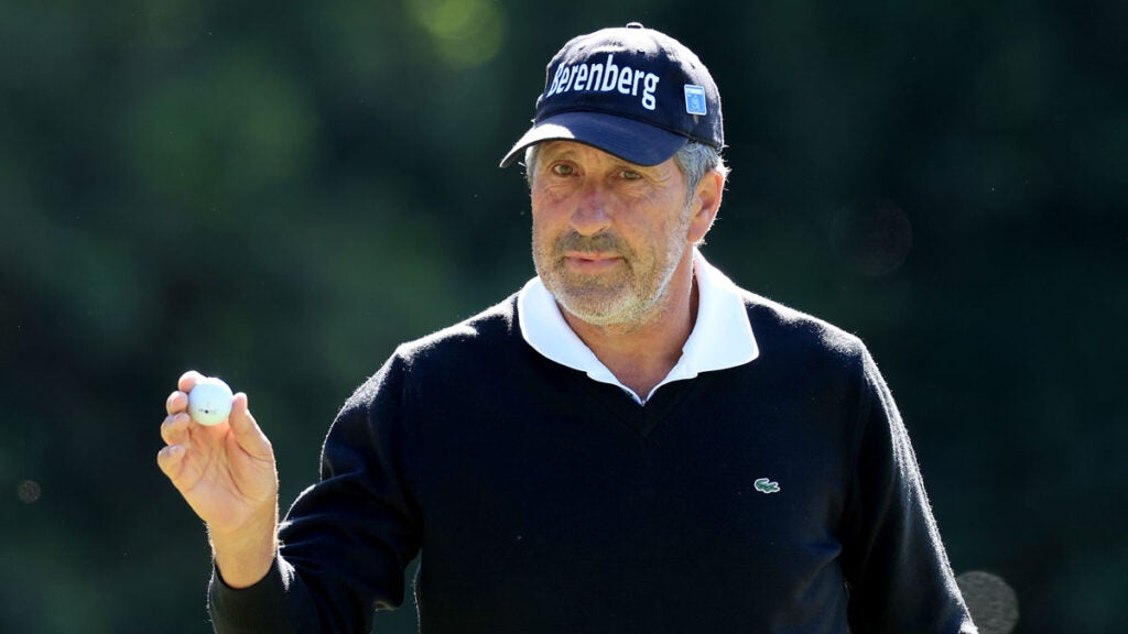 Jose Maria Olazabal of Spain acknowledges the patrons after making a par on the first hole during the third round of the 2024 Masters Tournament
