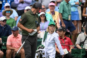 Adam Scott of Australia with his daughter, Bo Vera Scott, during the Par-3 Contest prior to Masters Tournament at Augusta National Golf Club on April 10, 2024 in Augusta, Georgia.