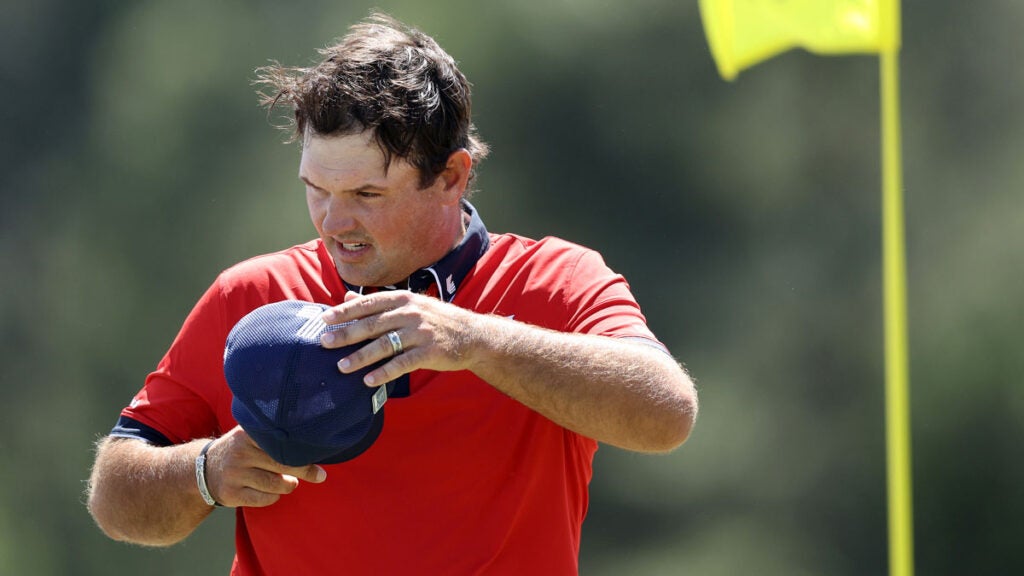Patrick Reed of the United States reacts on the 18th green during the second round of the 2024 Masters Tournament