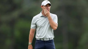Rory McIlroy of Northern Ireland reacts to a putt on the 18th green during the second round of the 2023 Masters Tournament