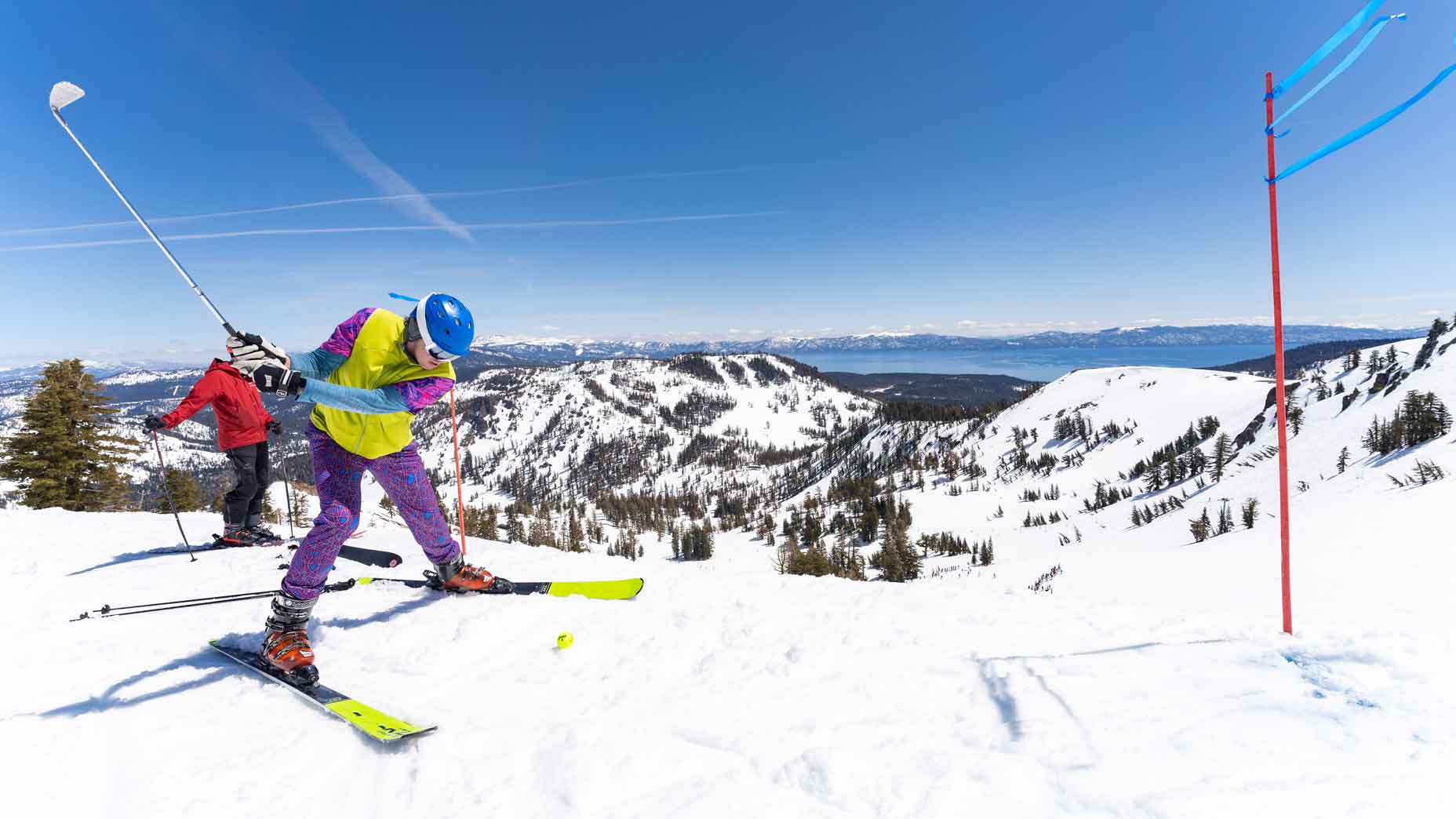 A skier playing snow golf in the Sierra mountains