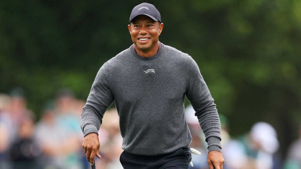 Tiger Woods walks down a fairway at the 2024 Masters.