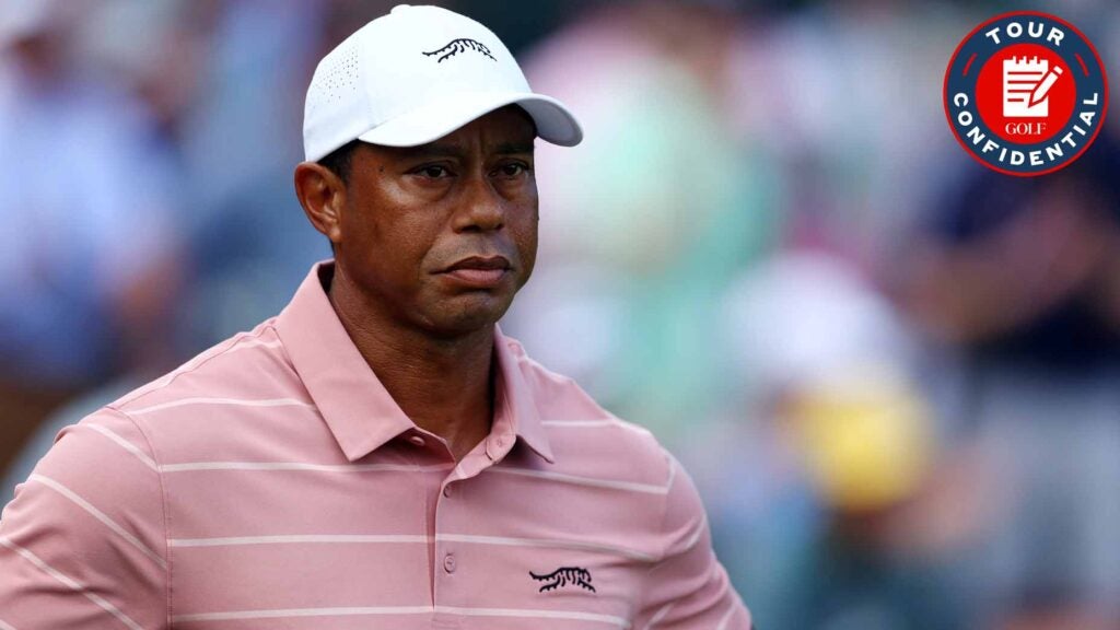 tiger woods stares ahead during the opening round of the 2024 masters