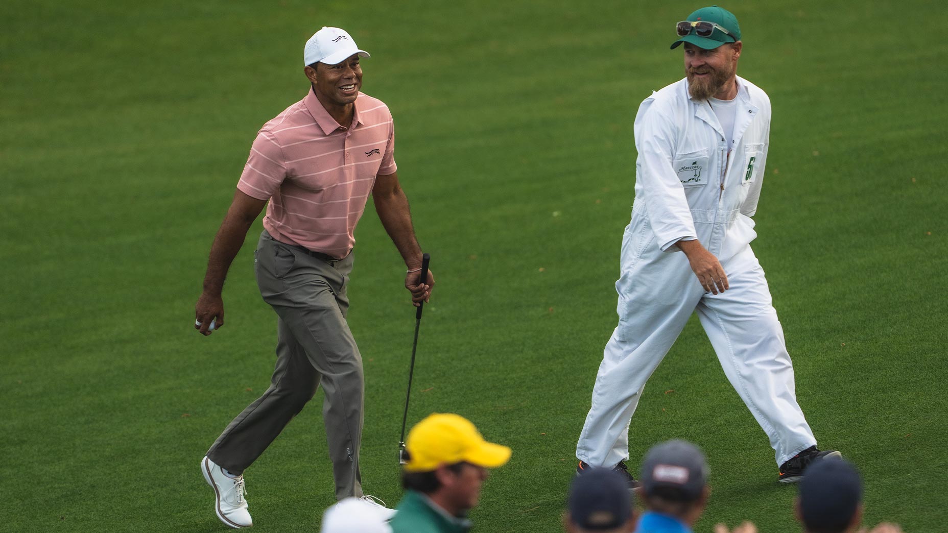 tiger woods laughs at amen corner with Joe Greiner at the Masters.