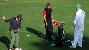 tiger woods and charlie woods practice swing together at Masters Sunday