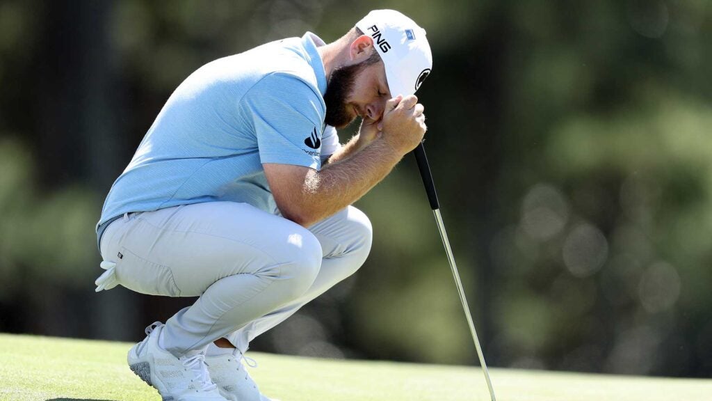 Pro golfer Tyrrell Hatton reacts to a putt on the 18th green during the second round of the 2024 Masters.