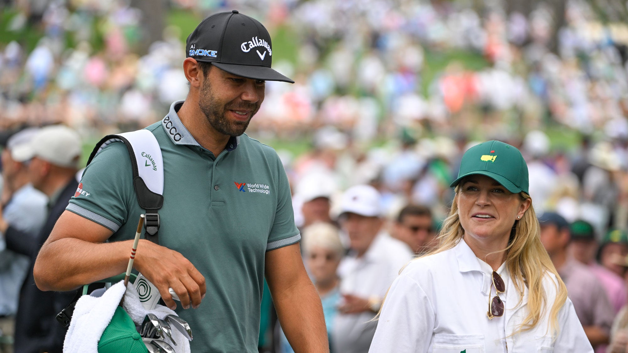 Erik van Rooyen of South Africa with his wife, Rose, during the Par-3 Contest prior to Masters Tournament at Augusta National Golf Club