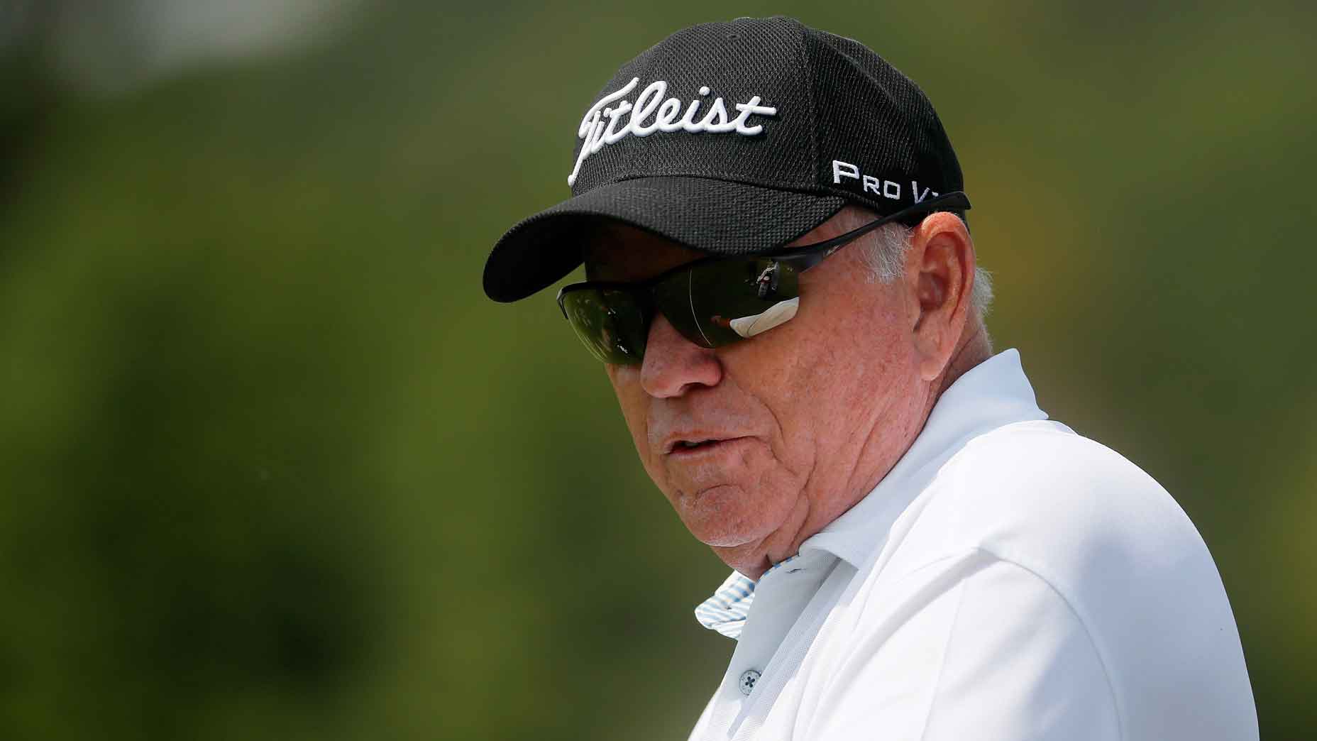 Coach Butch Harmon looks on at the range during the third round of the TOUR Championship at East Lake Golf Club on September 23, 2017 in Atlanta, Georgia.