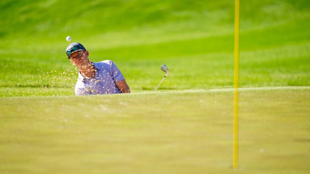 Jeremy Wells hits a bunker shot at the PGA Championship.