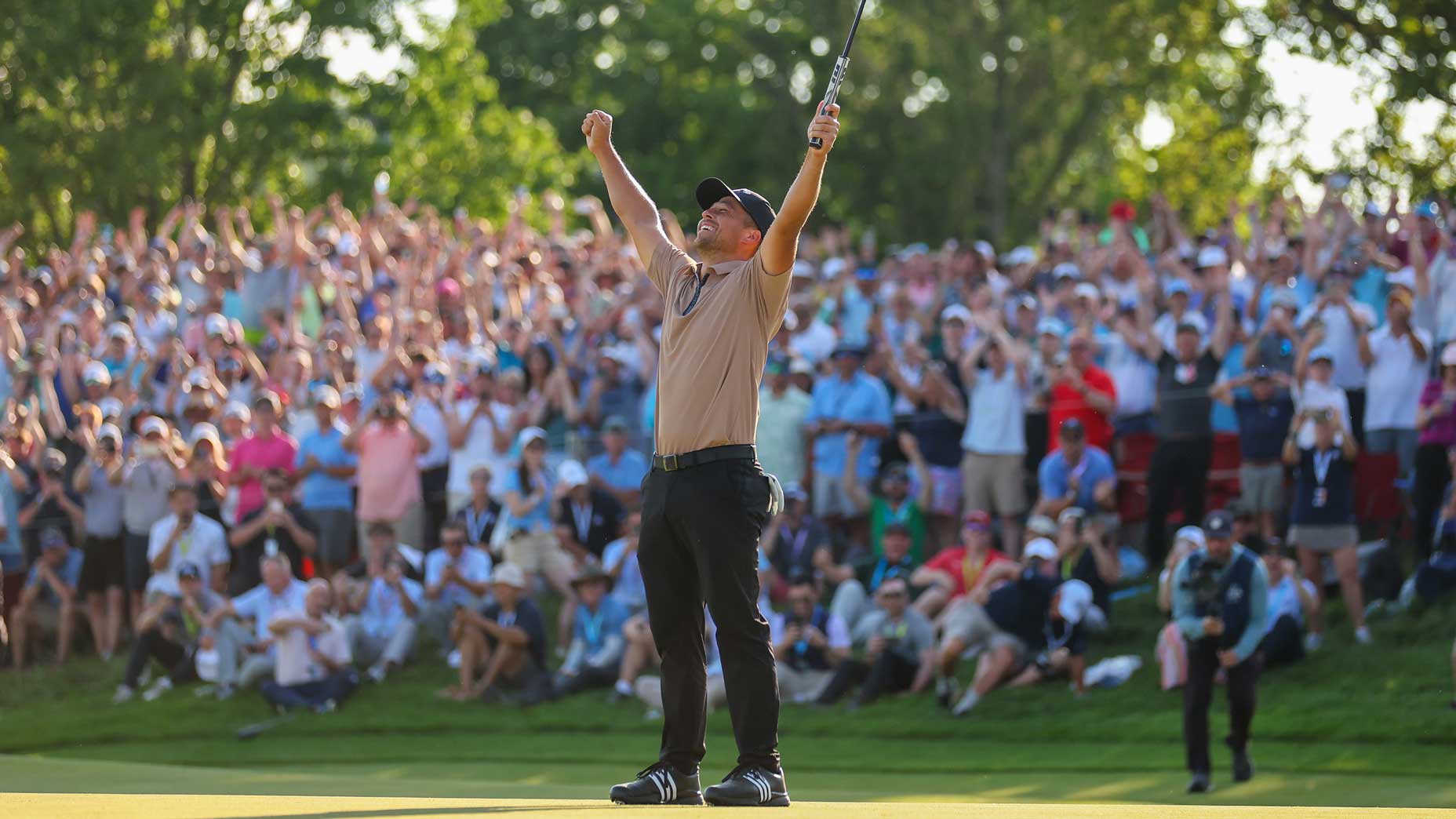 Xander Schauffele celebrates winning the PGA Championship.