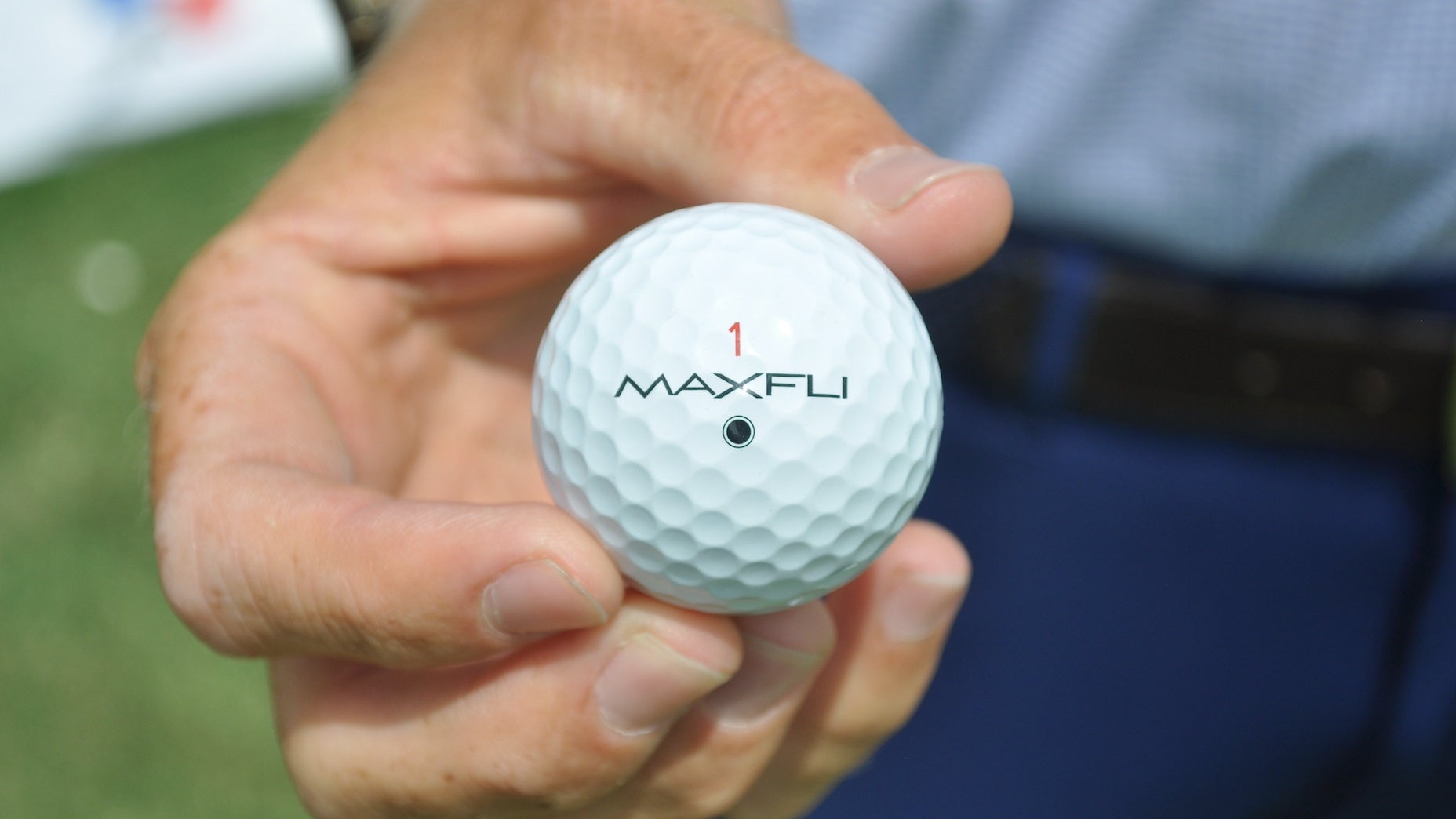ben griffin holds his maxfli tour x golf ball at the cj cup byron nelson