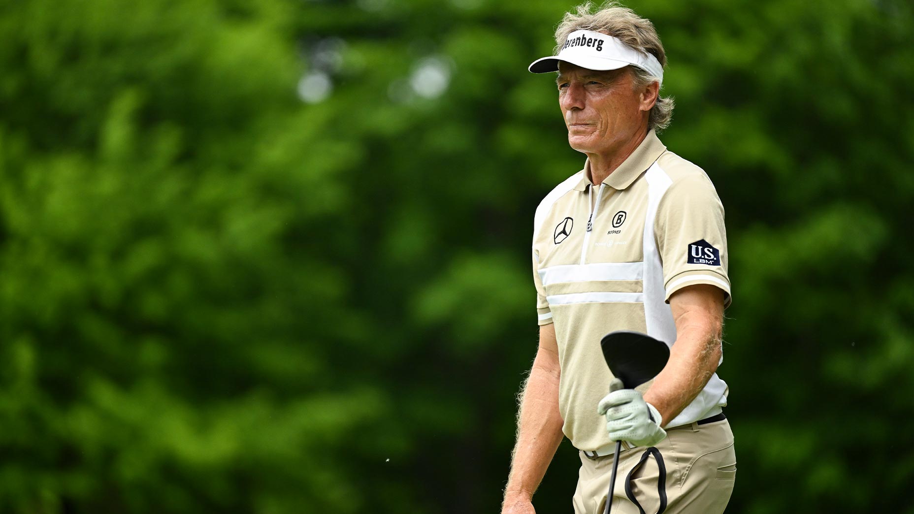 bernhard langer holds driver at KitchenAid Senior PGA Championship.