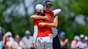 lexi thompson hugs rose zhang at the 2024 u.s. women's open