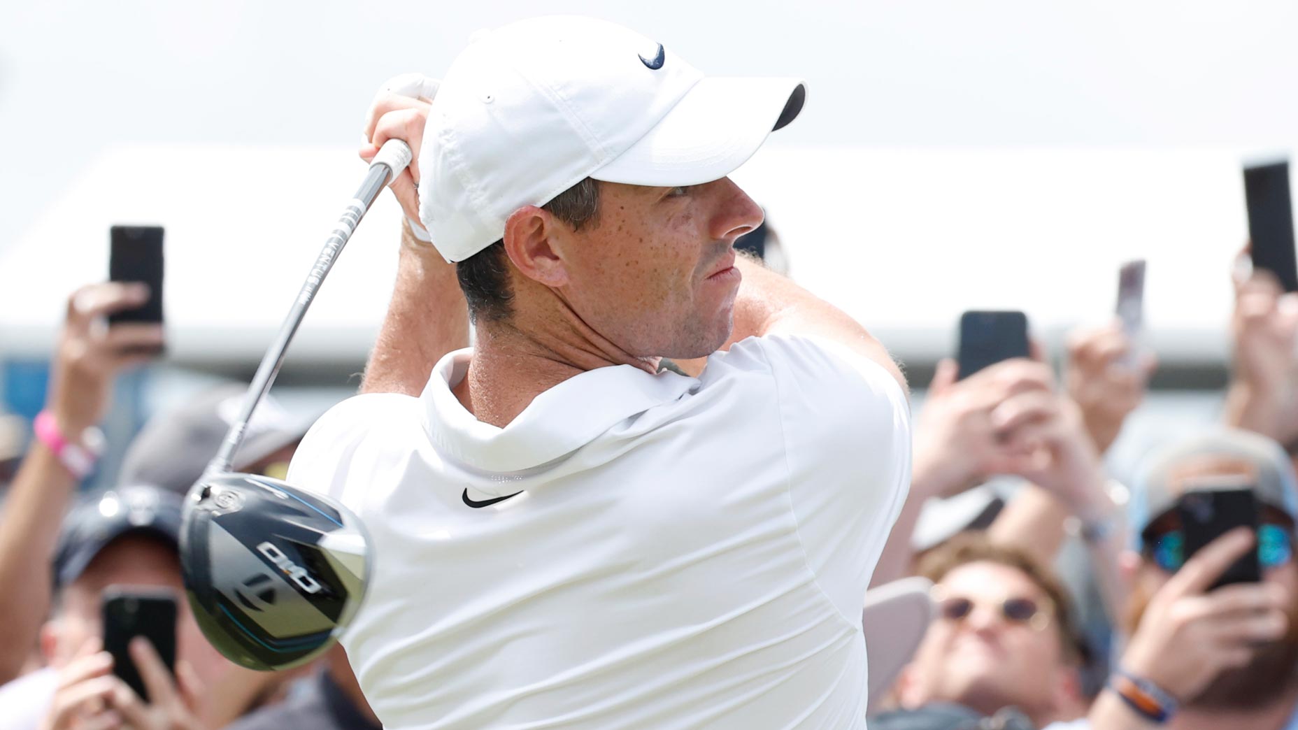 Pro golfer Rory McIlroy hits drive at Zurich Classic.