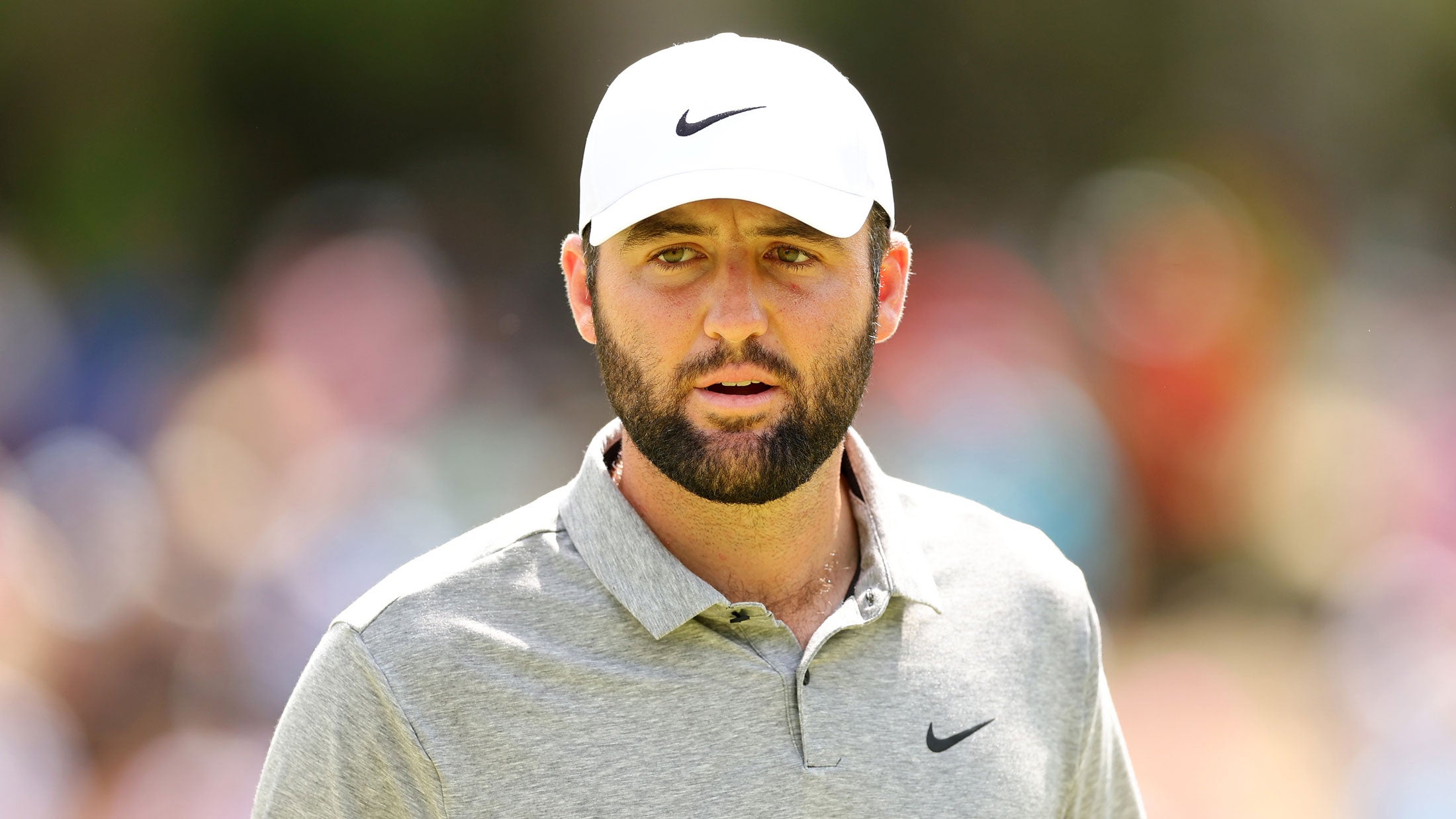 Scottie Scheffler of the United States reacts to his putt on the eighth green during the third round of the 2024 PGA Championship at Valhalla Golf Club on May 18, 2024 in Louisville, Kentucky.