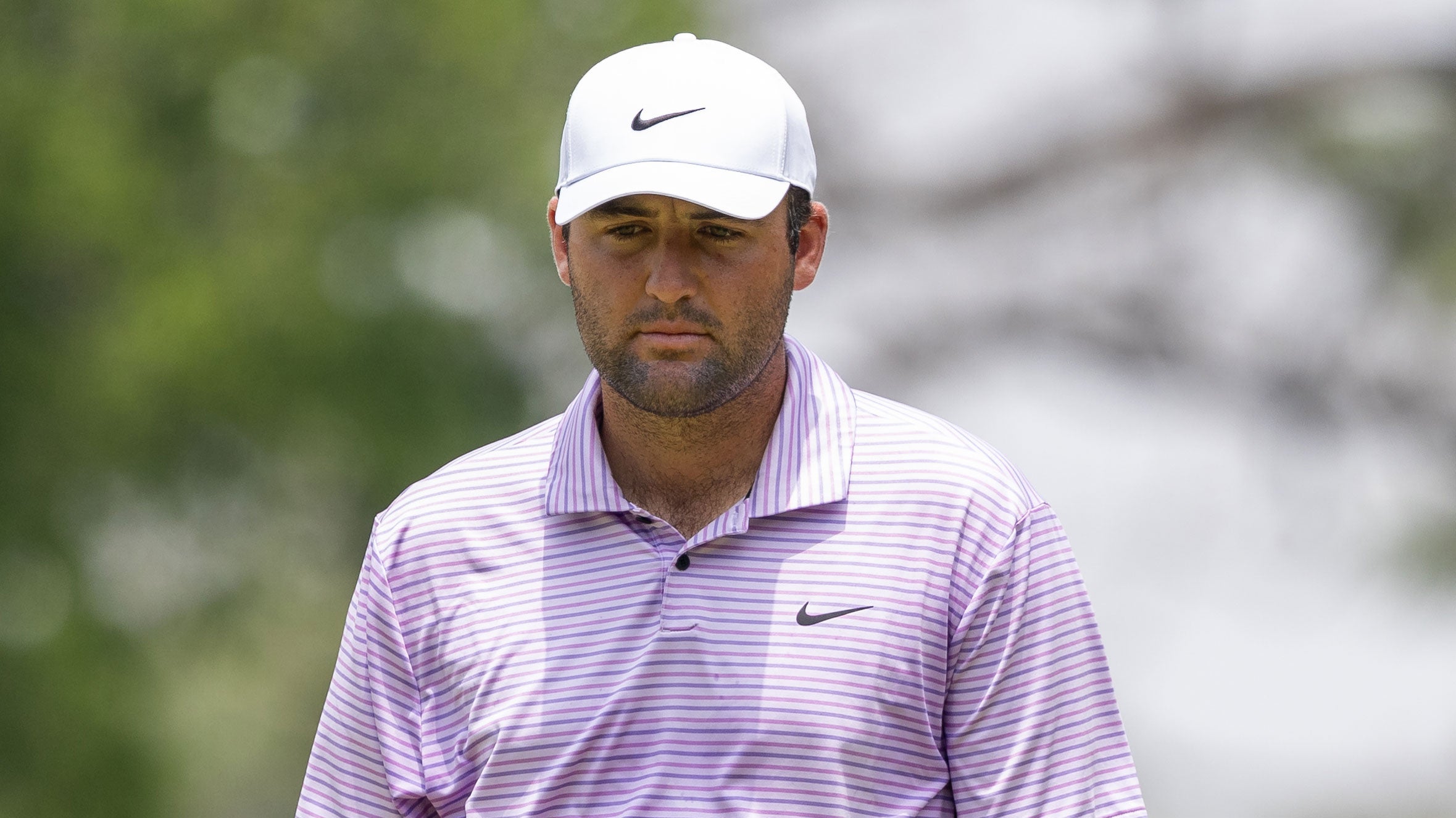 Scottie Scheffler looks at his putt on hole number 8 during the third round of the Charles Schwab Challenge at Colonial Country Club on May 25, 2024 in Fort Worth, Texa