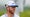 talor gooch stares at the PGA Championship in a white hat and blue shirt