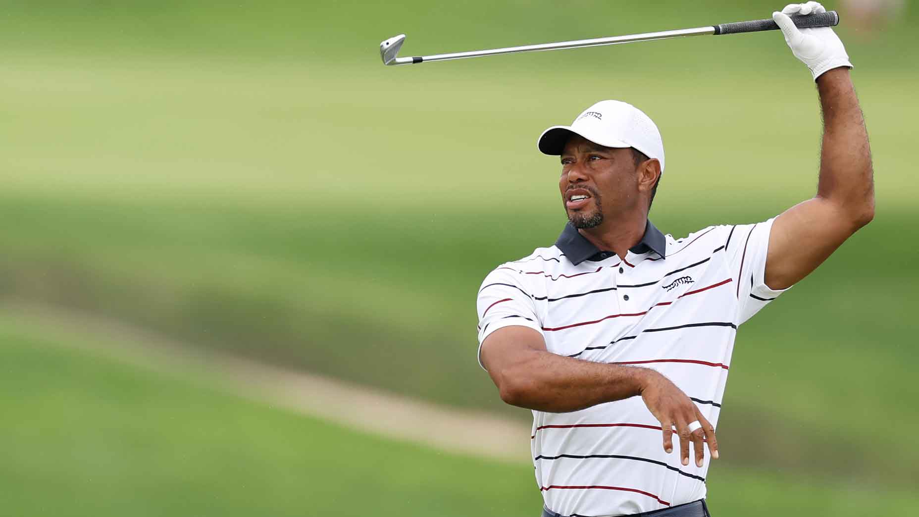 Tiger Woods of the United States reacts to his second shot on the seventh hole during the second round of the 2024 PGA Championship at Valhalla Golf Club on May 17, 2024 in Louisville, Kentucky.
