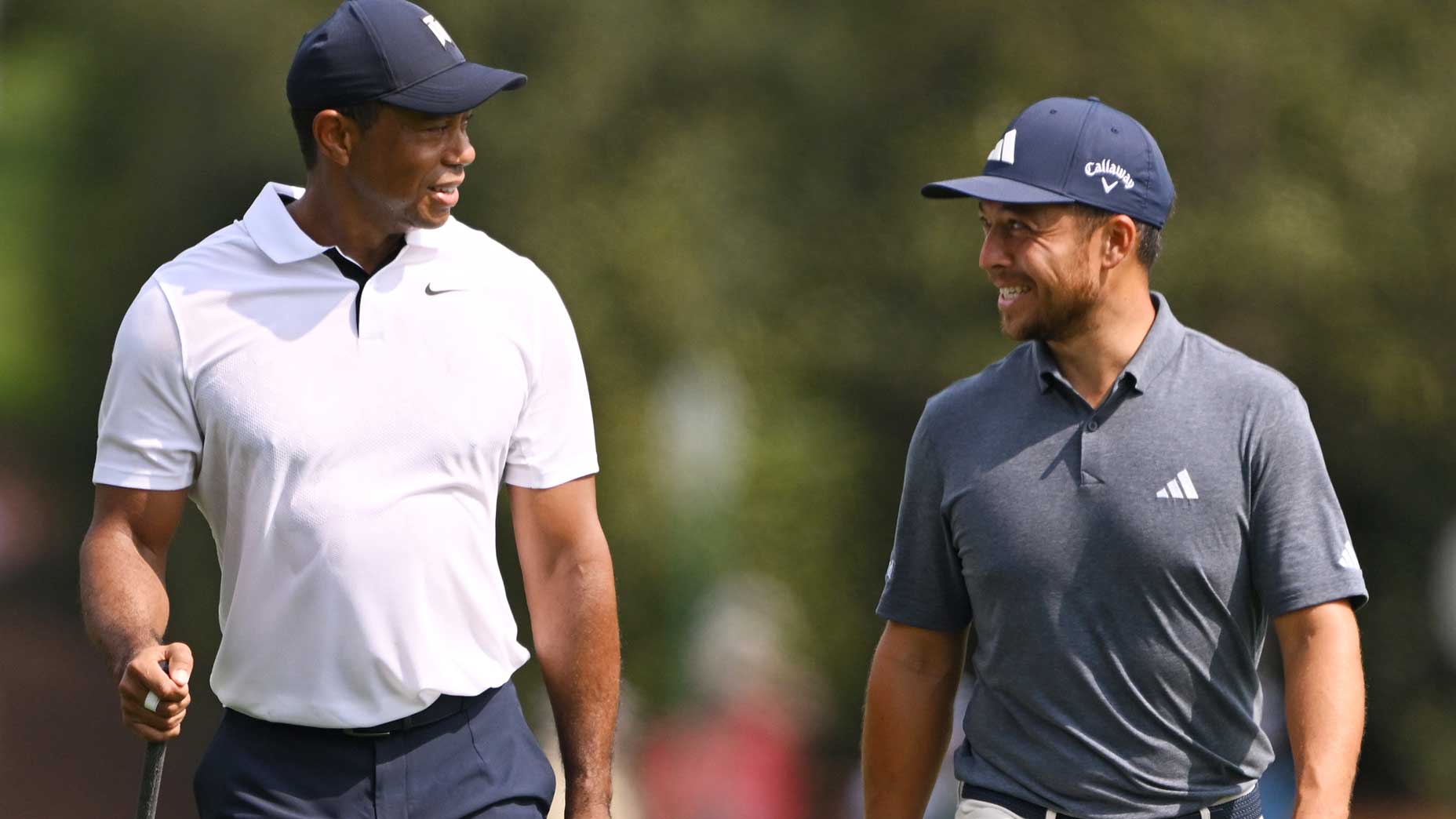 Tiger Woods and Xander Schauffele at the 2023 Masters.