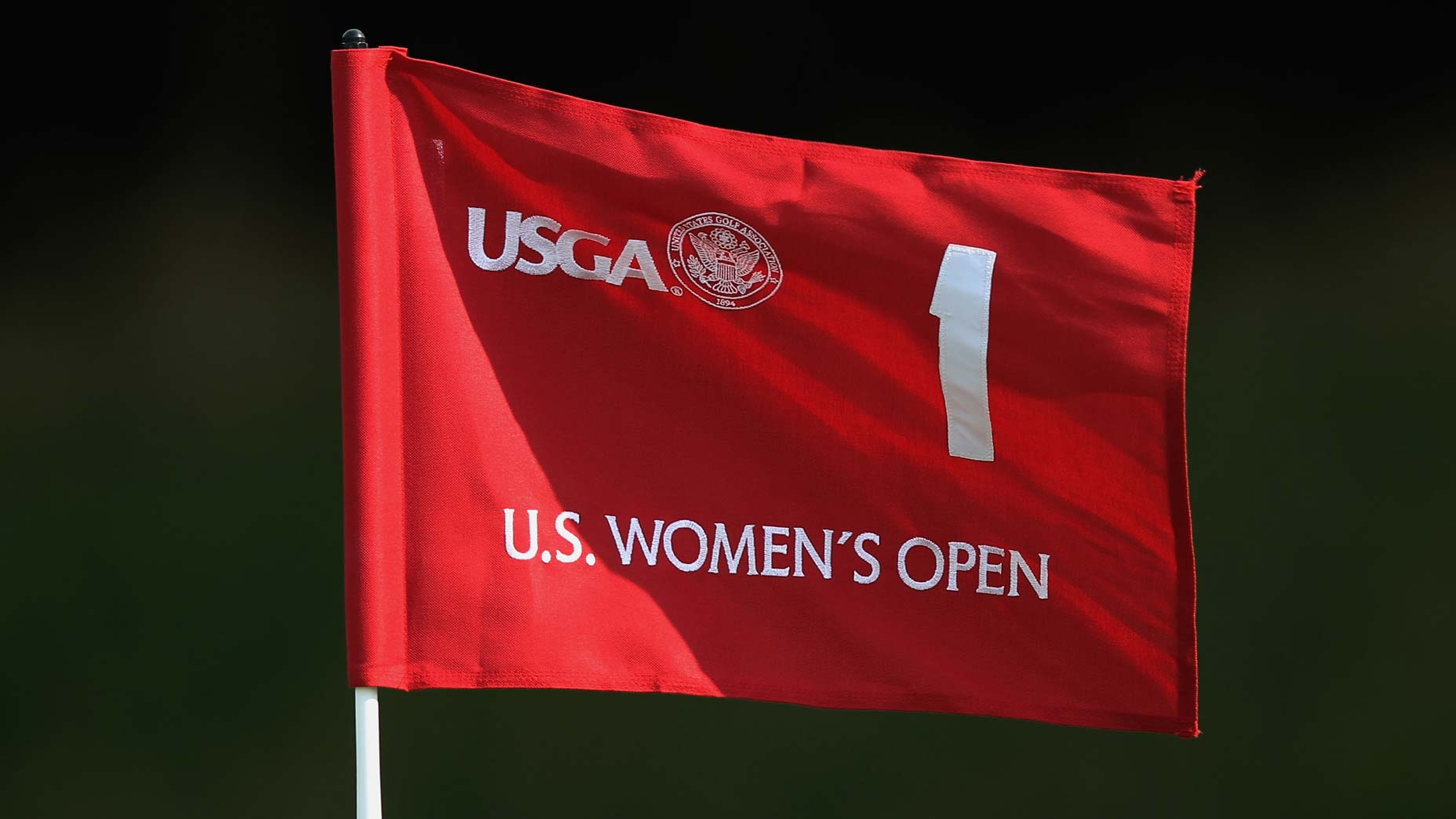 A red U.S. Women's Open flagstick pictured at previous event