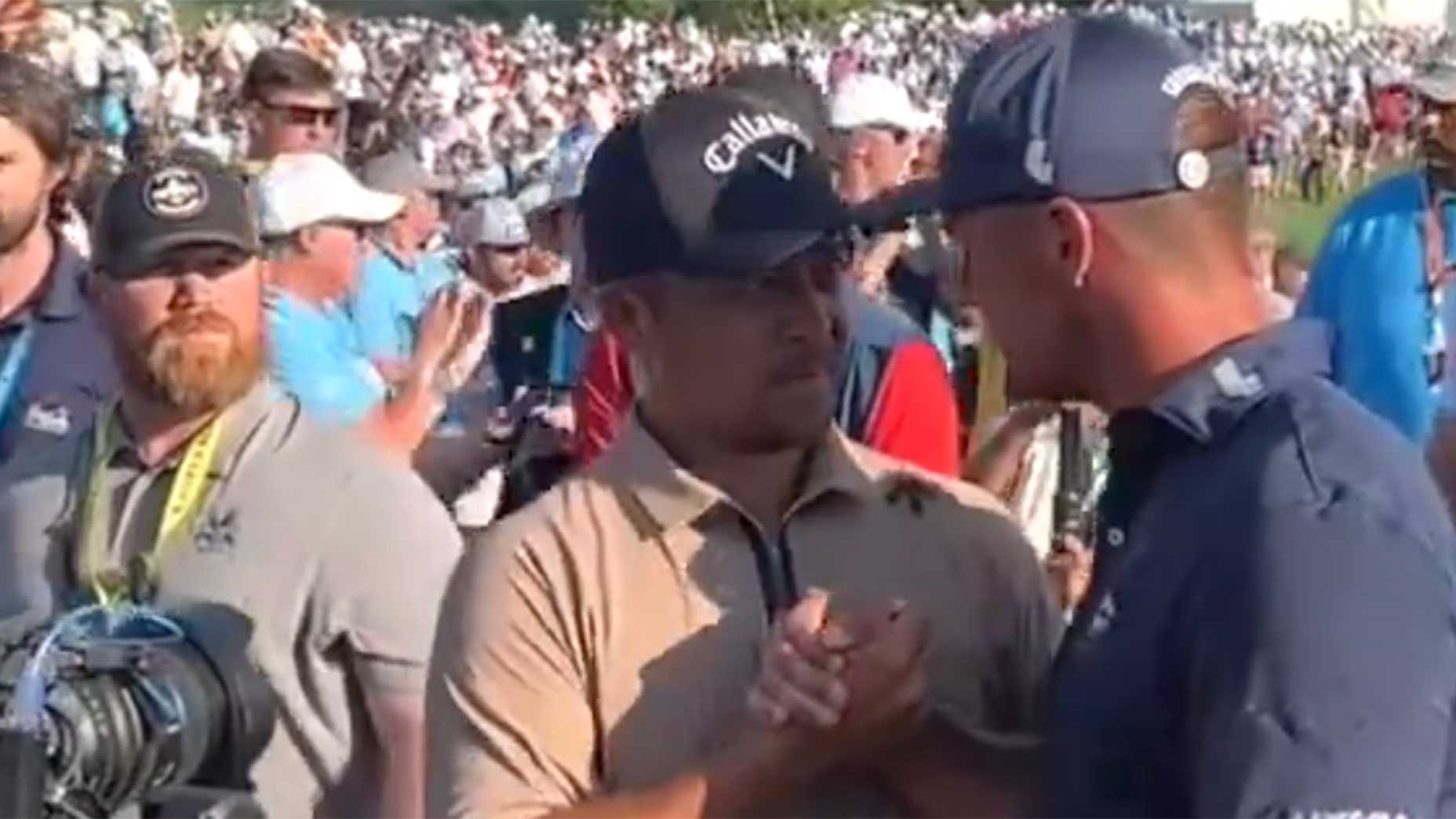 Xander Schauffele is congratulated by Bryson DeChambeau after Schauffele won the 2024 PGA Championship on Sunday.