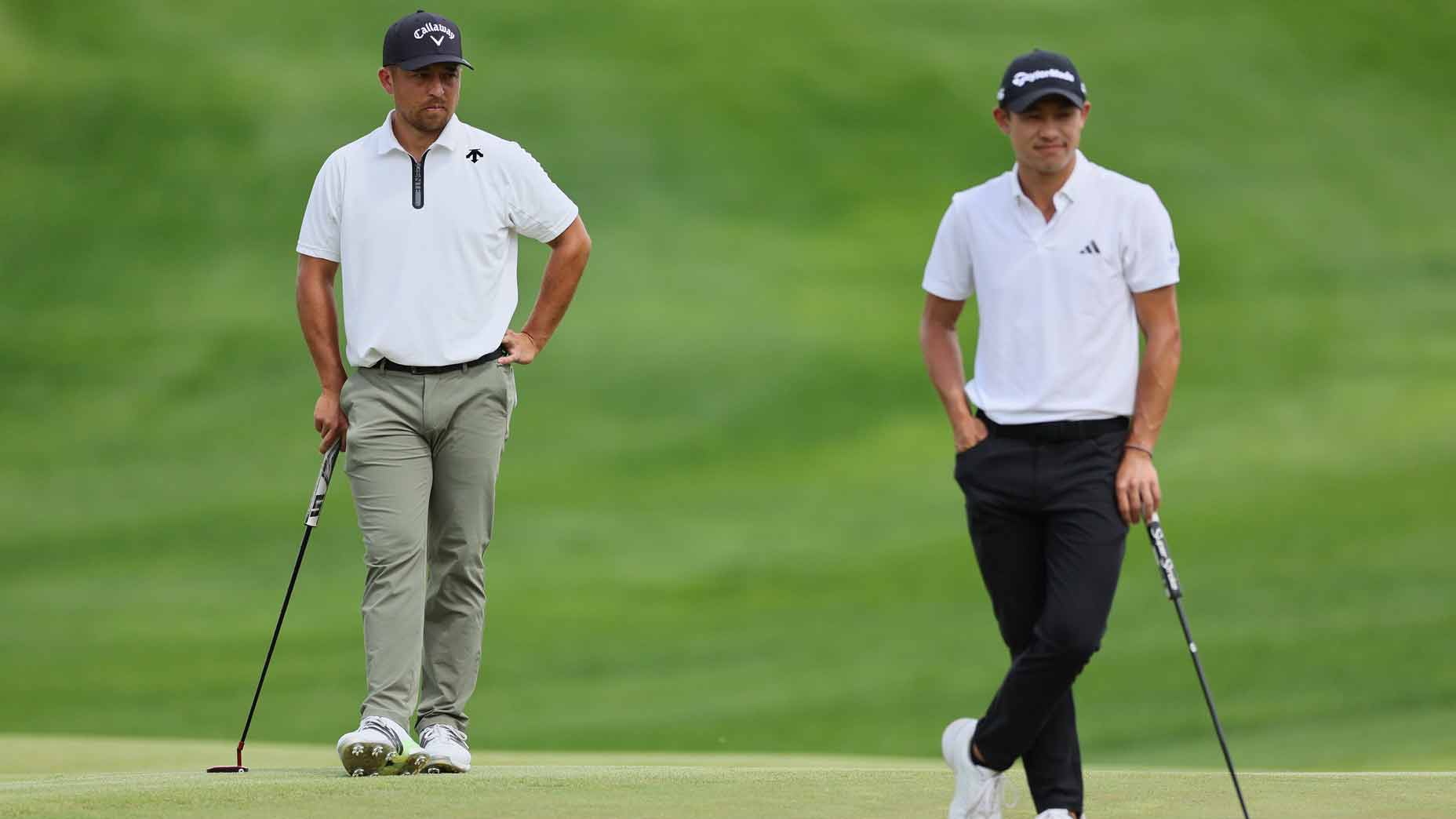 collin morikawa and xander schauffele stand on a green together during the 2024 pga championship at valhalla